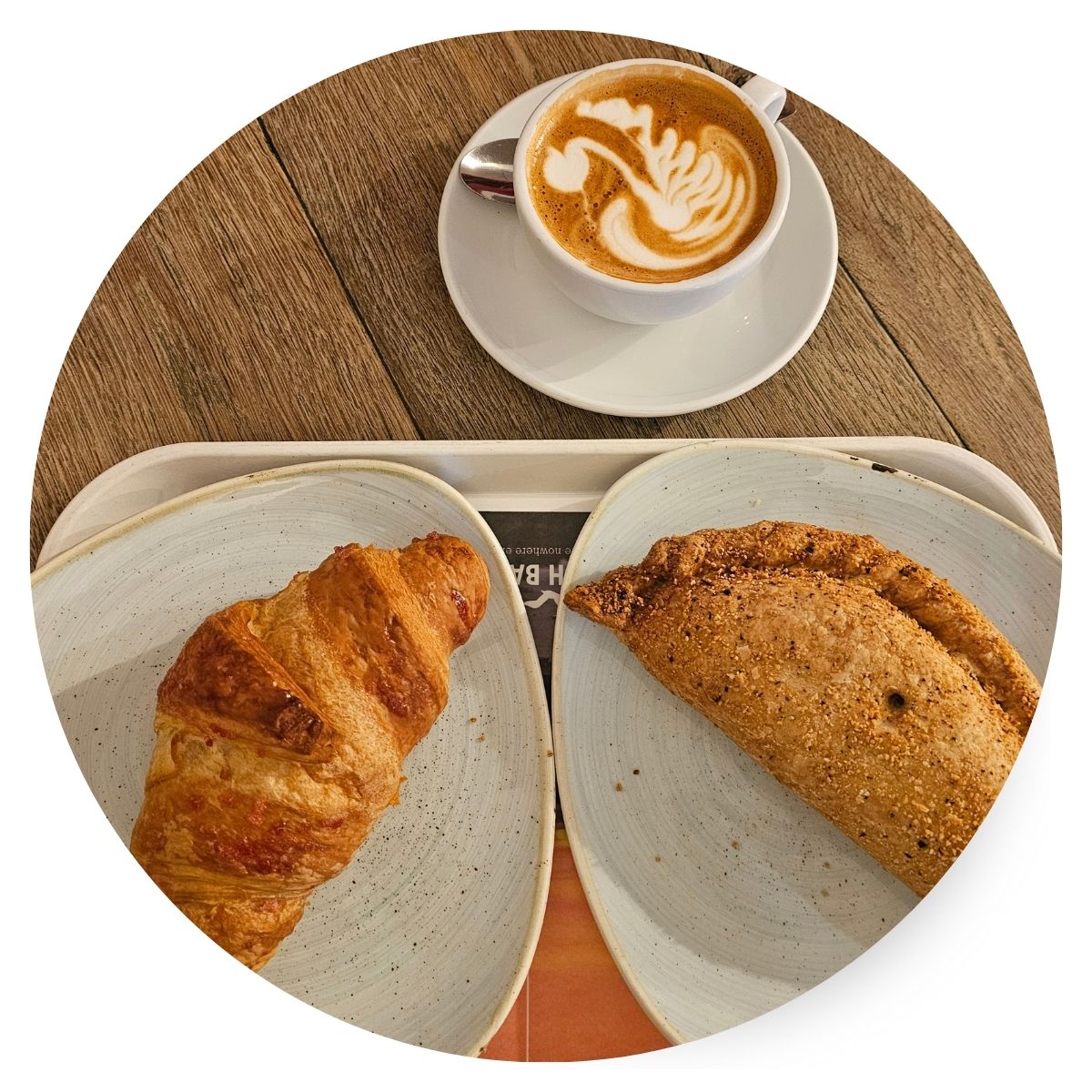 A photo of coffee, pasty and croissant