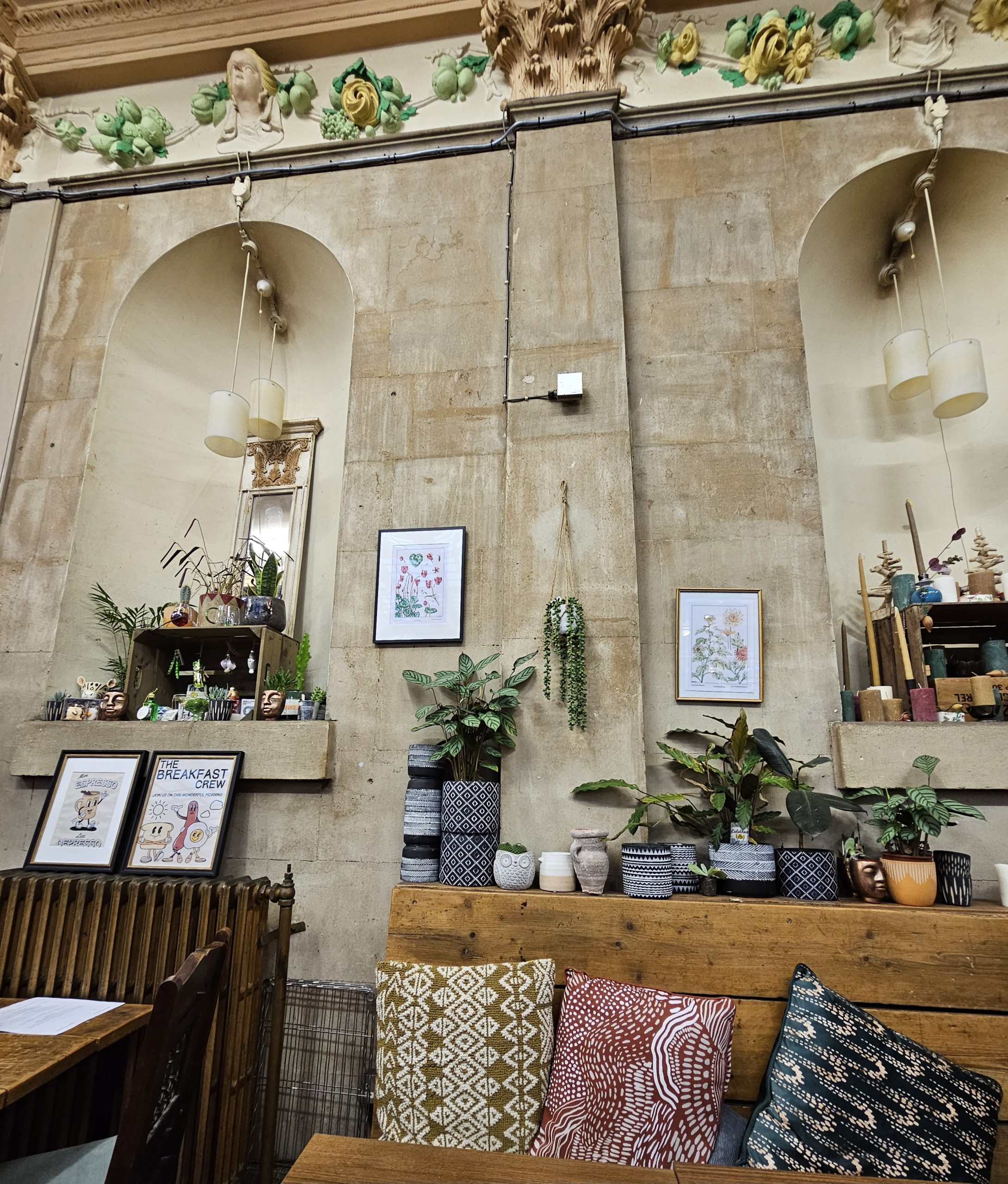 An aesthetic café at St. Nicholas Market in Bristol, offering a cosy ambiance with charming décor and a warm atmosphere