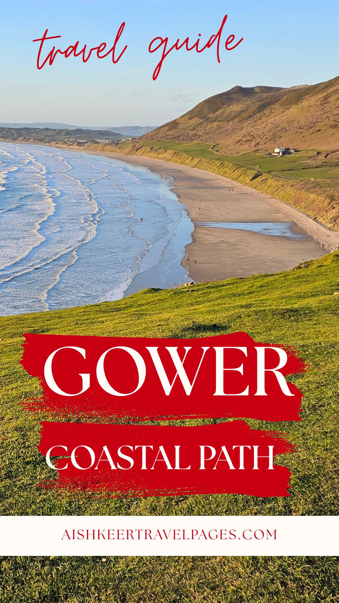 A vertical Pinterest-style travel guide for the Gower Coastal Path. The image features a sunny, high-angle view of Rhossili Bay’s sandy shore and rolling waves. Large red brushstroke banners in the center feature the text "GOWER COASTAL PATH" in white. At the top, "travel guide" is written in red script, and the website AISHKEERTRAVELPAGES.COM is at the bottom.